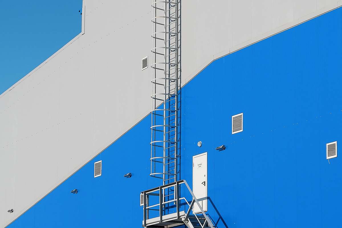 blue gray and blue building fire exit architecture
