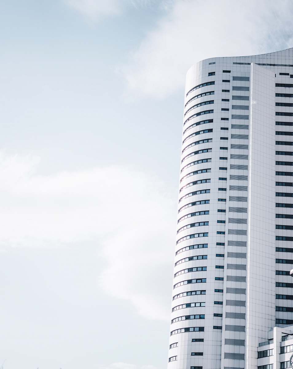 city gray high-rise building during day high rise