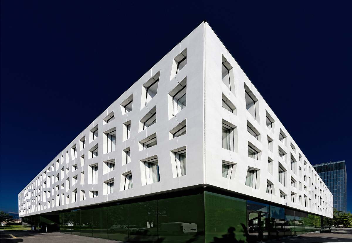 risch-rotkreuz low-angle photography of white and green painted building switzerland