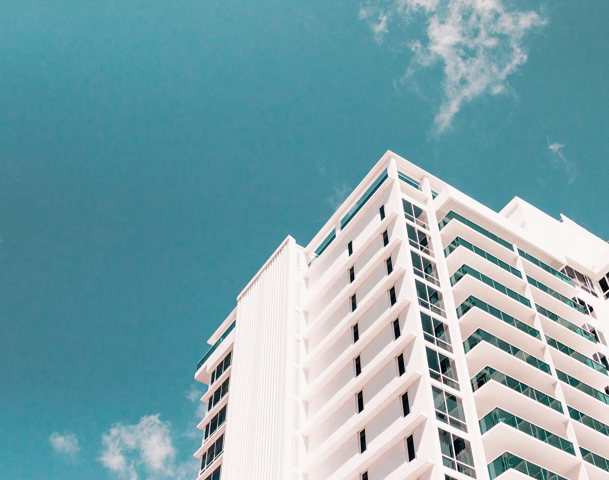 housing low-angle photography of white building city