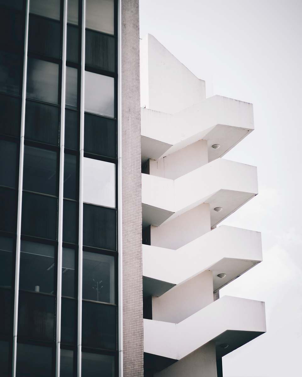 paris low angle photography of white high rise building aluminium