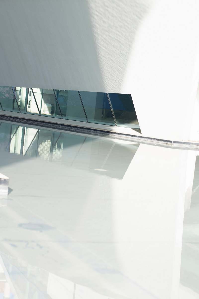 grey mirrors reflected on white polished floor architecture
