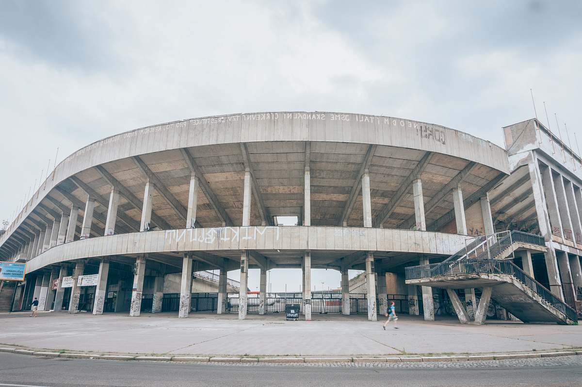 architecture panoramic photo of gray building at daytime arena