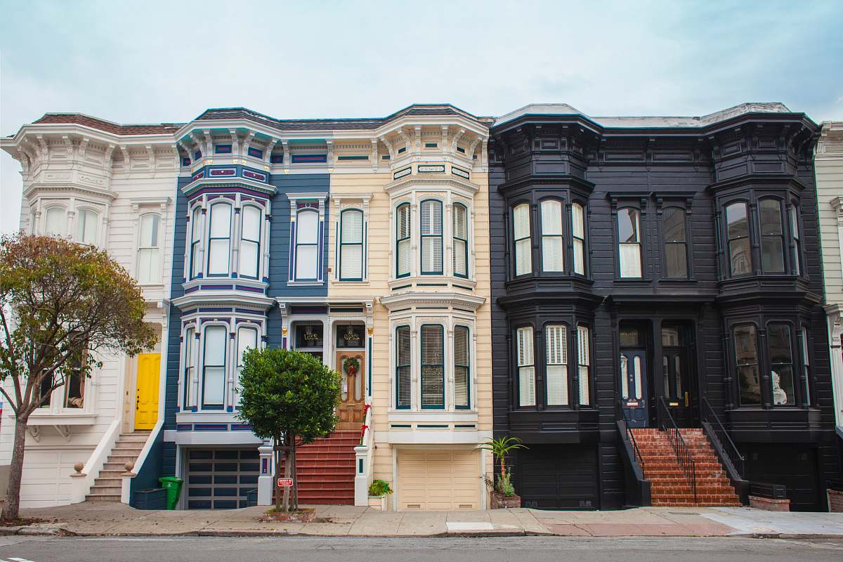house photo of black, white, and blue house home