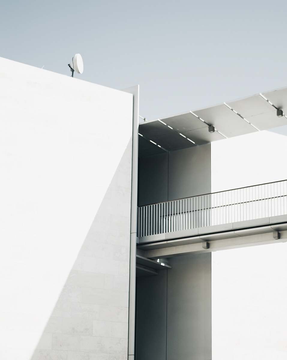 architecture white building under sky staircase