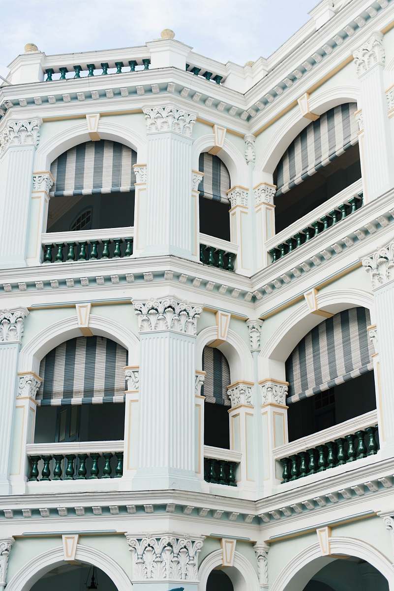 balcony white concrete building at daytime architecture