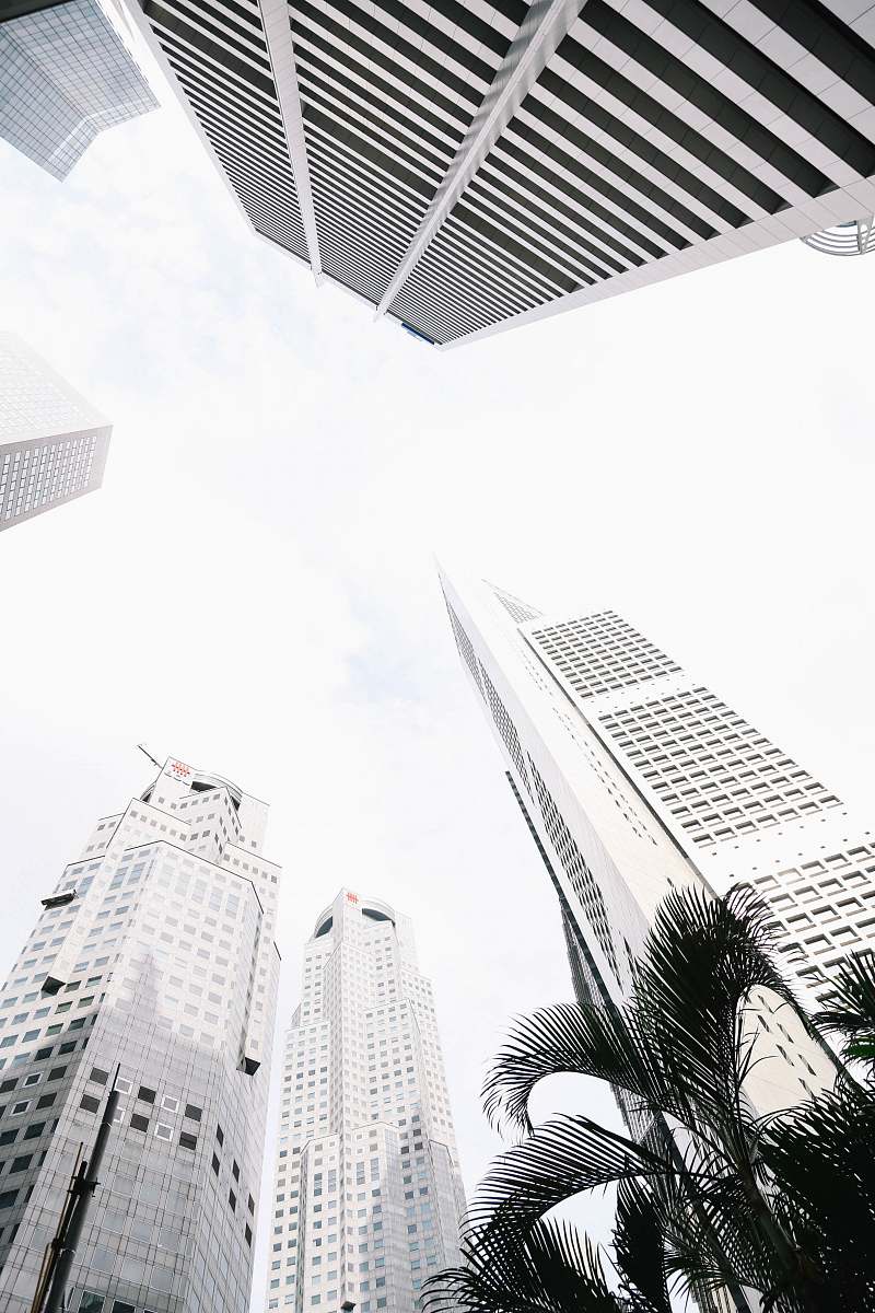 city white concrete building low-angle photography high rise