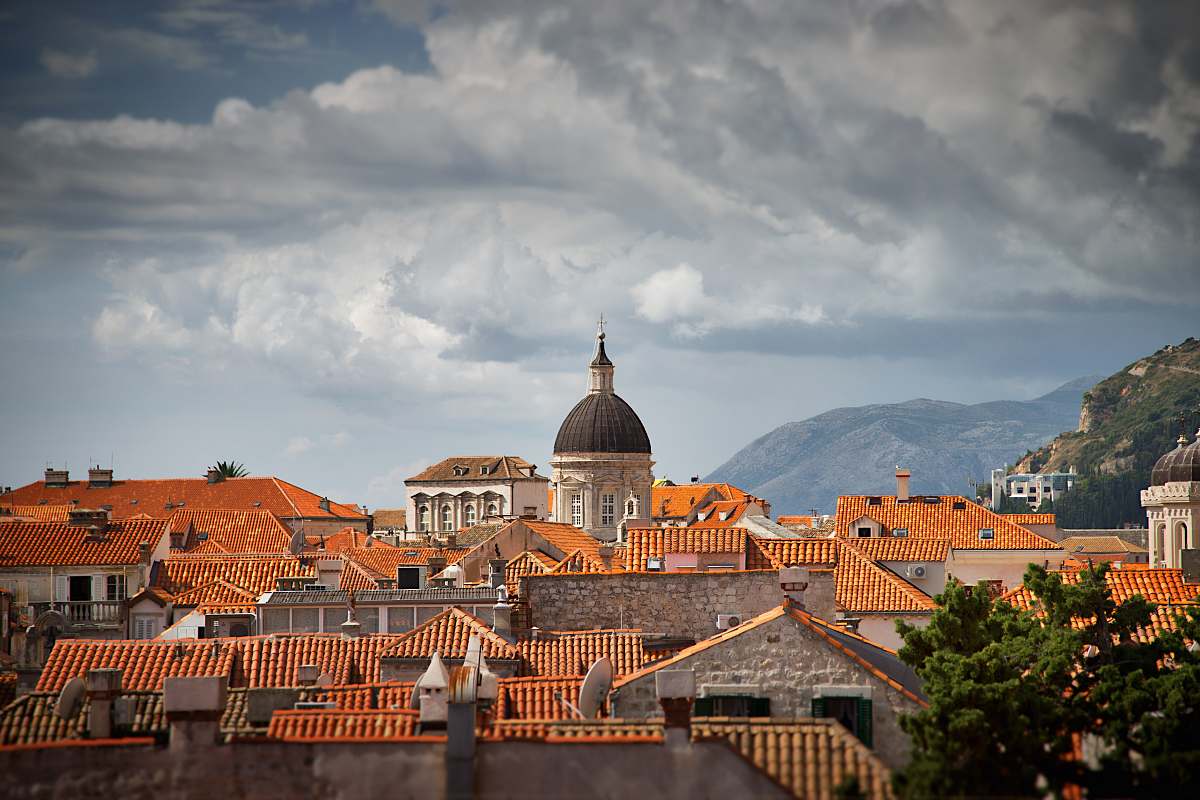 dome white concrete domed tower near houses at daytime croatia
