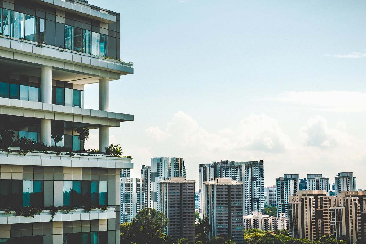 urban white high-rise building at daytime housing