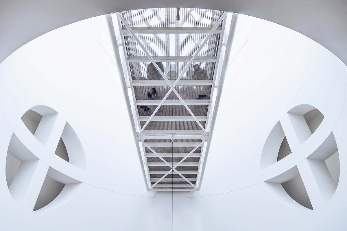 architecture worm's eye photography of white concrete building star symbol