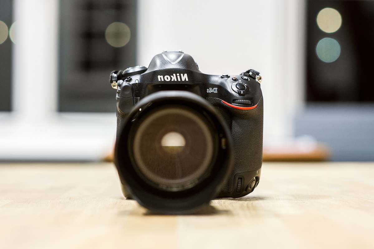 electronics selective focus photography of black Nikon DSLR camera the hague