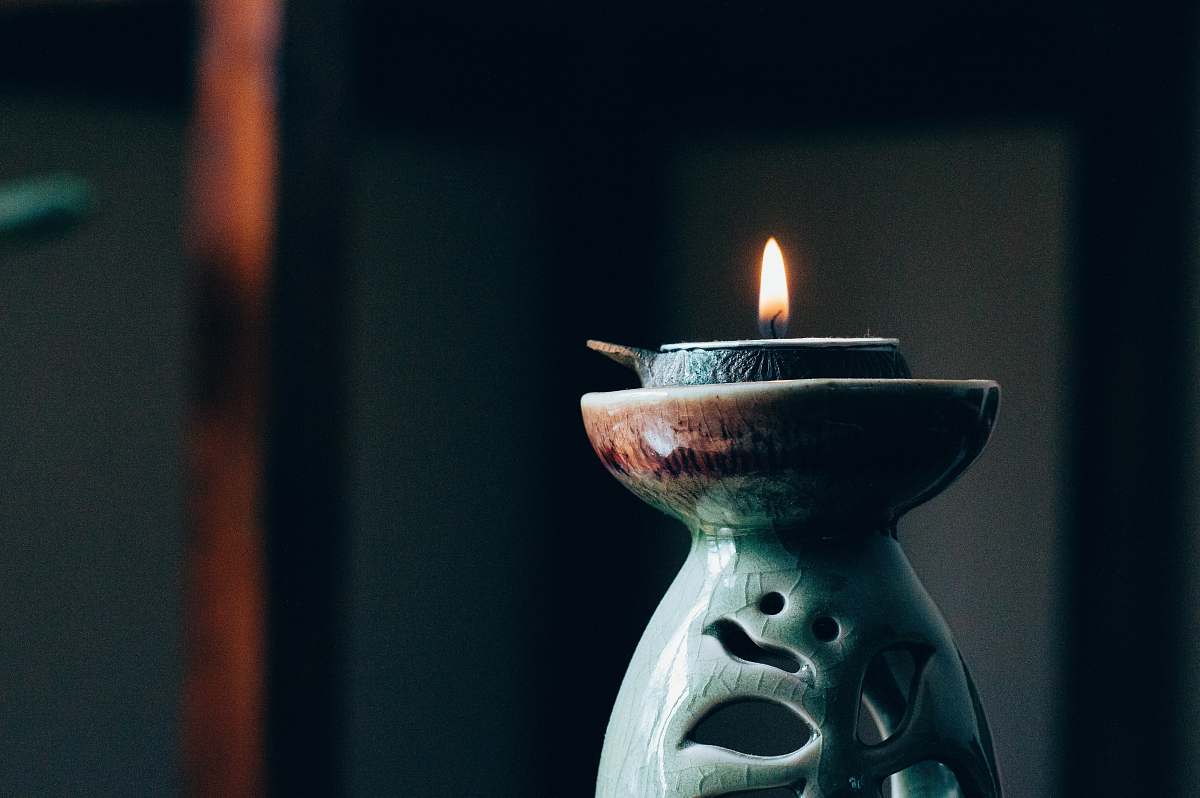 spiritual rule of thirds photography of lit candle flame