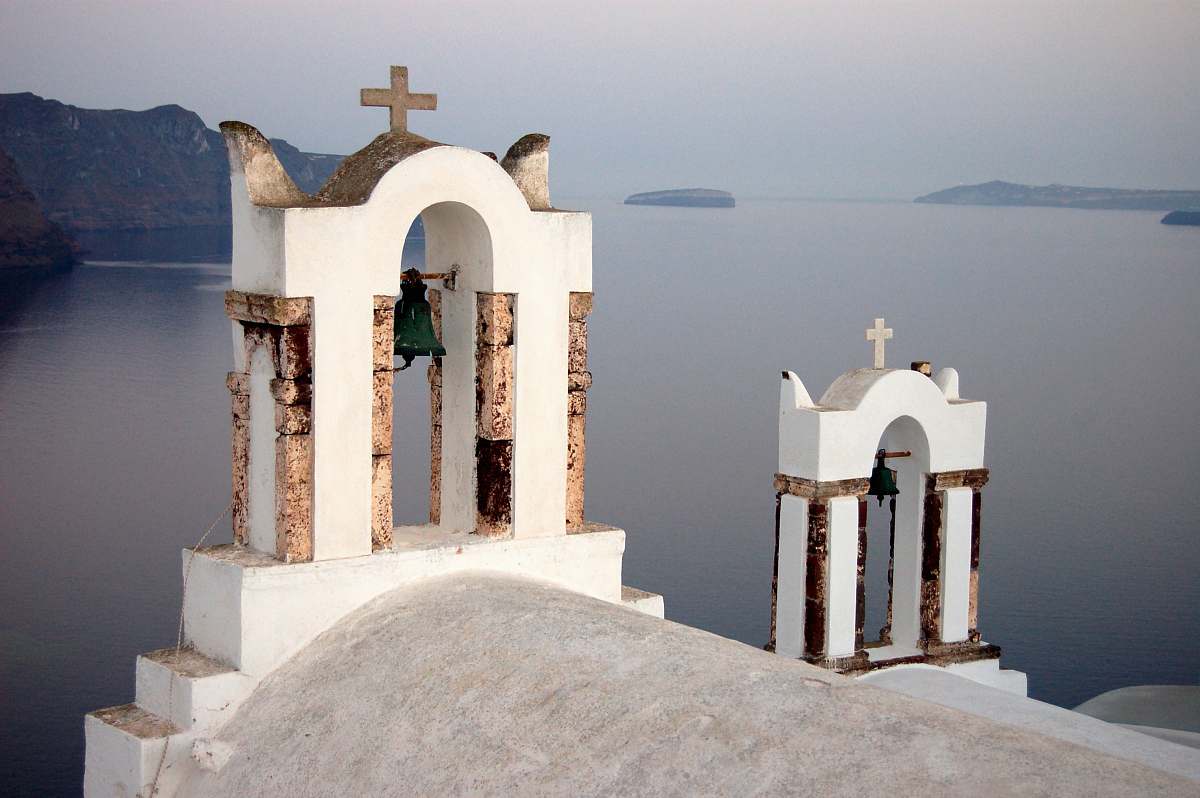 greece white and brow church roof during daytime banister