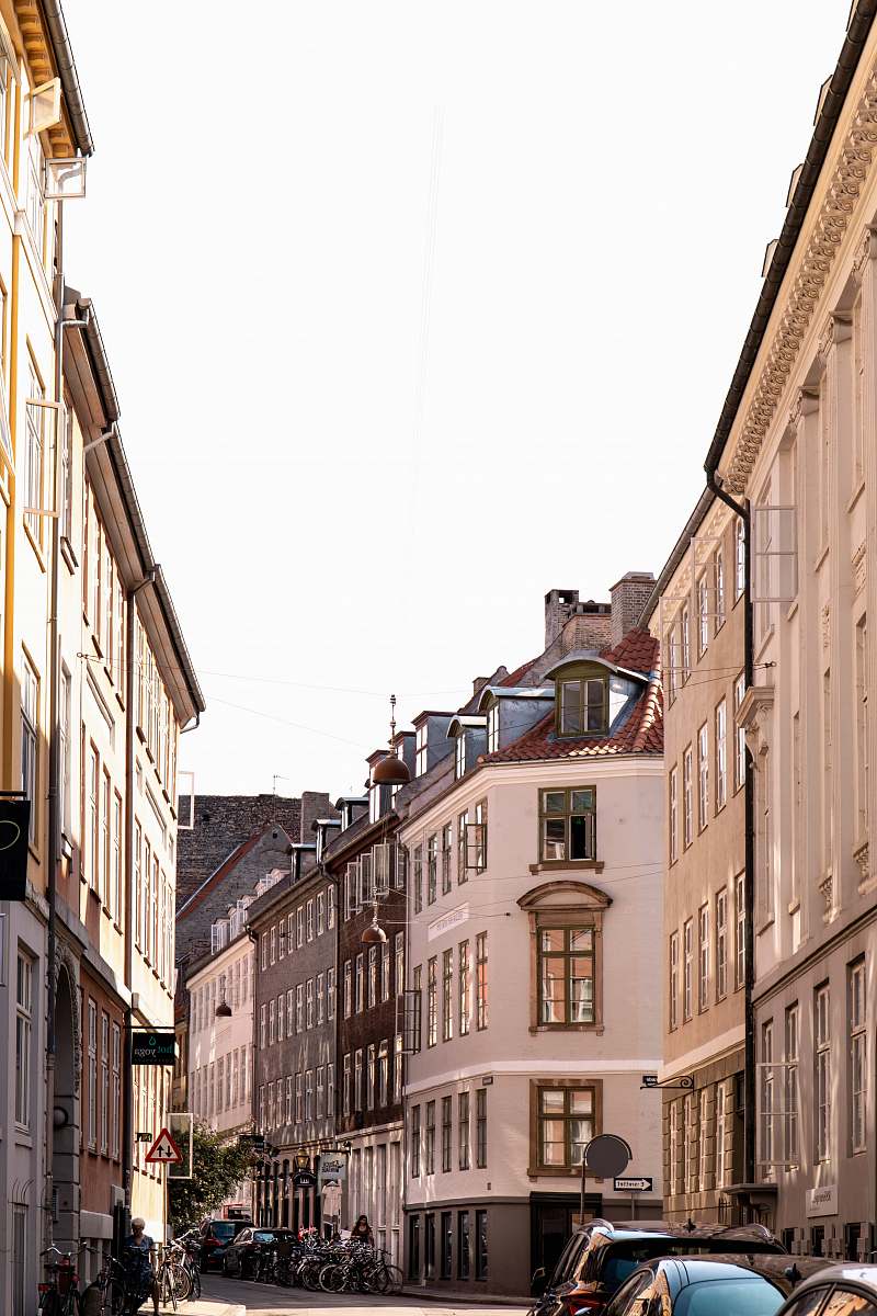 town white and brown concrete building during daytime street
