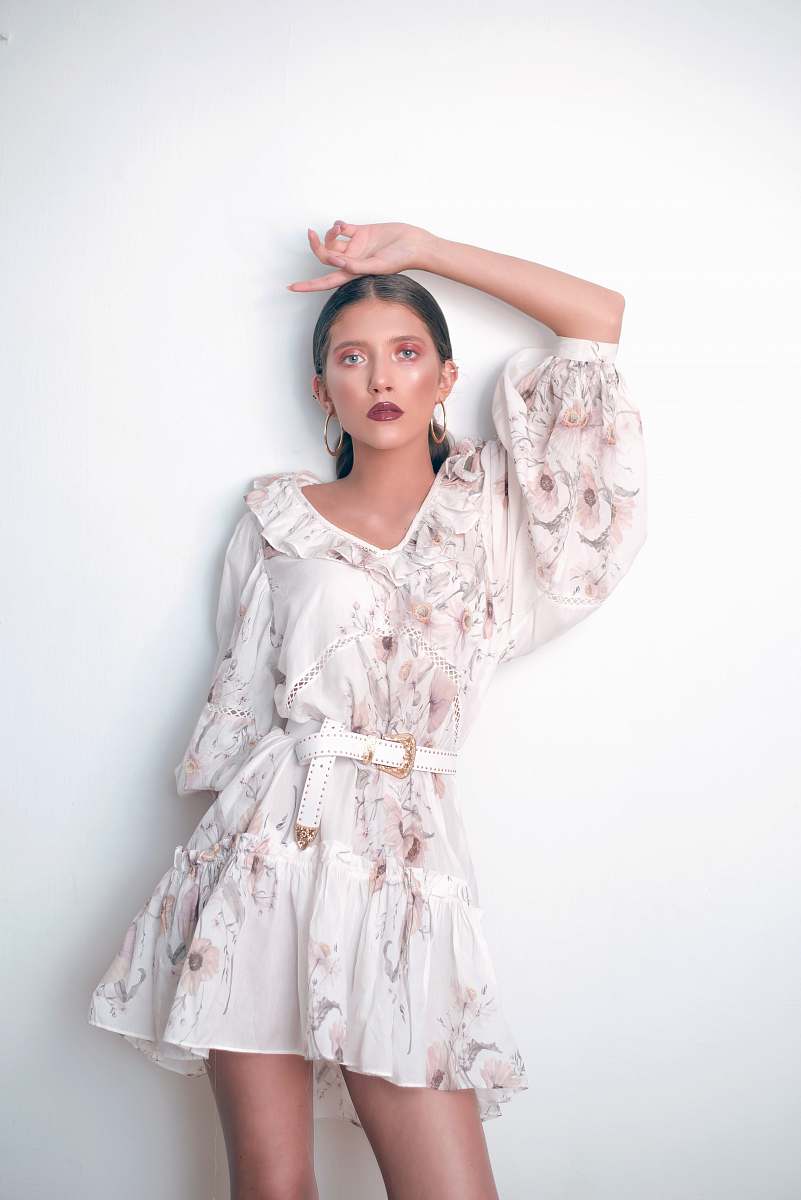 apparel woman wearing white V-neck long-sleeved dress fashion
