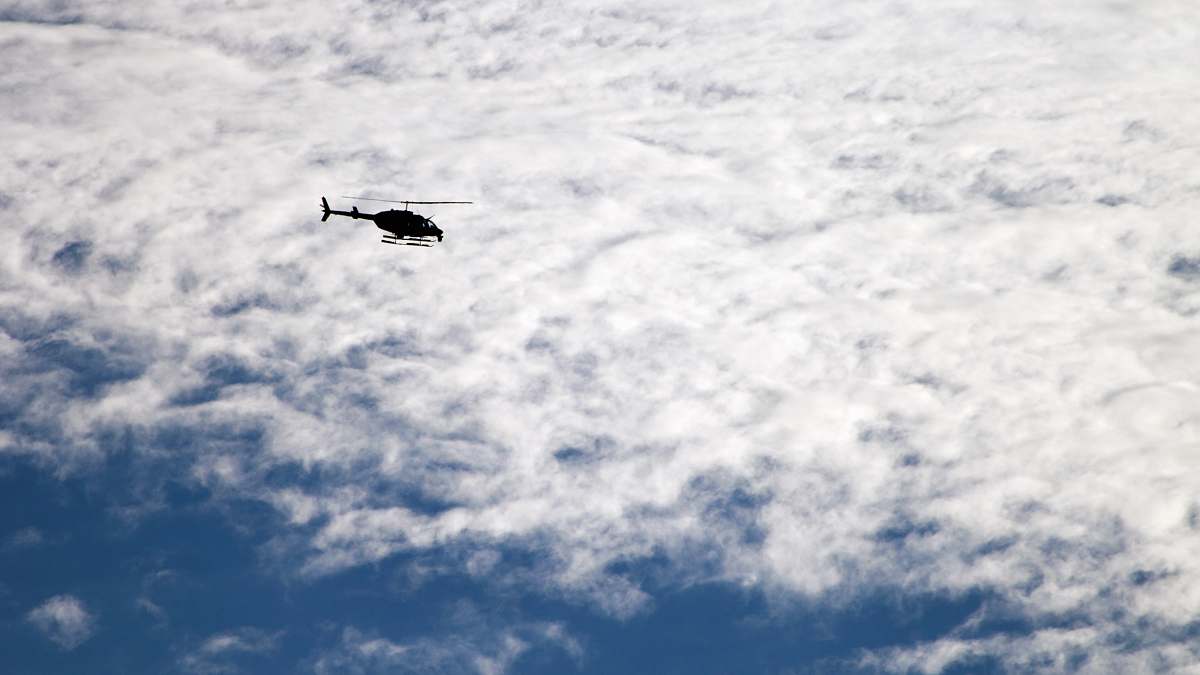 blue helicopter in the sky helicopter