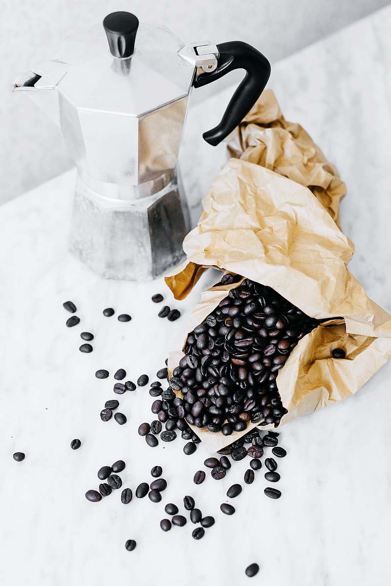 bean black coffee beans and gray mocha pot pot