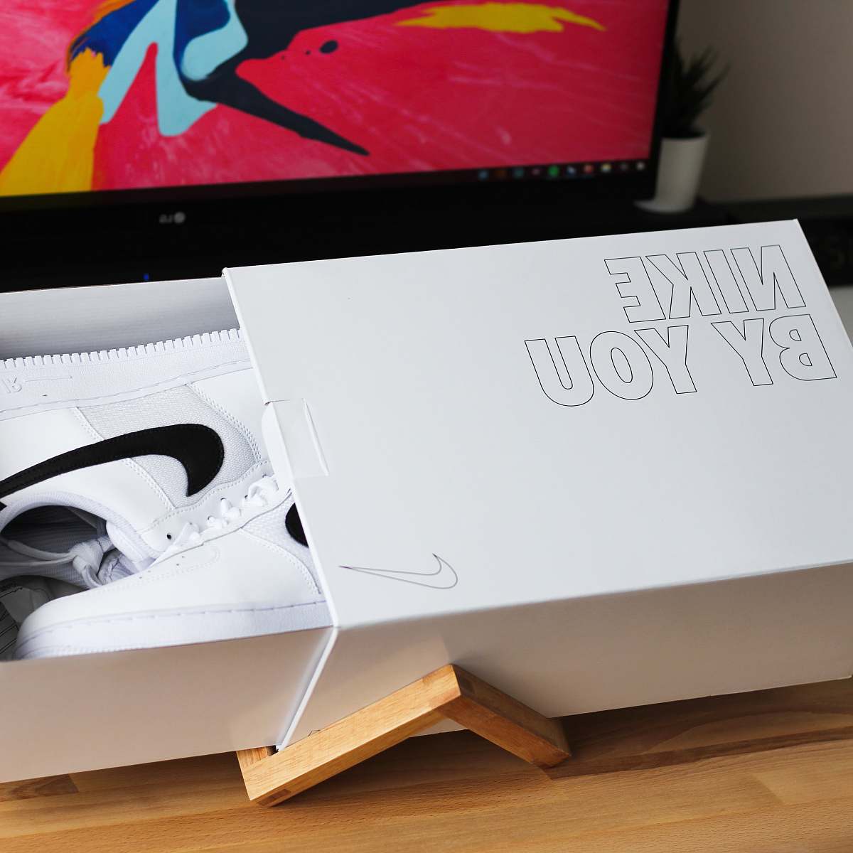 electronics white Nike Air Max shoes in box display