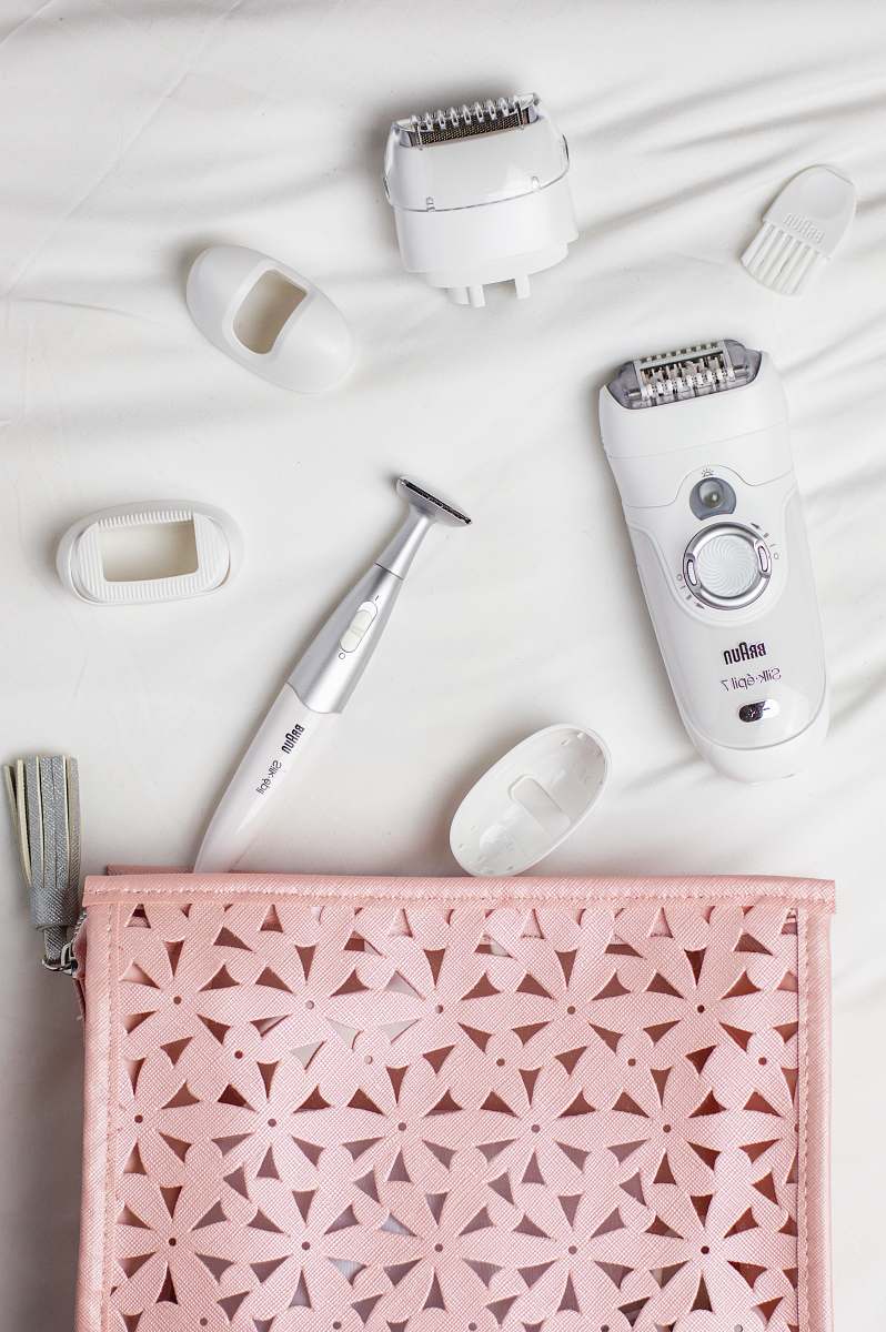 shaver epilator and shaver on white cloth shave