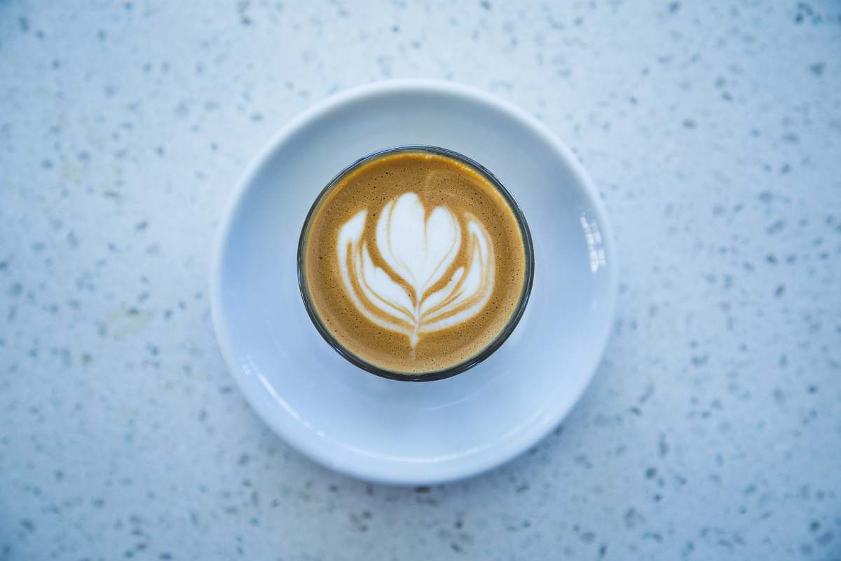 drink espresso coffee with heart cream formation beverage