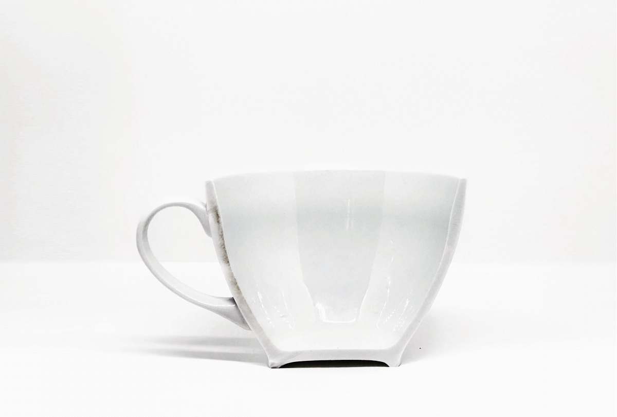 grey white ceramic mug black-and-white
