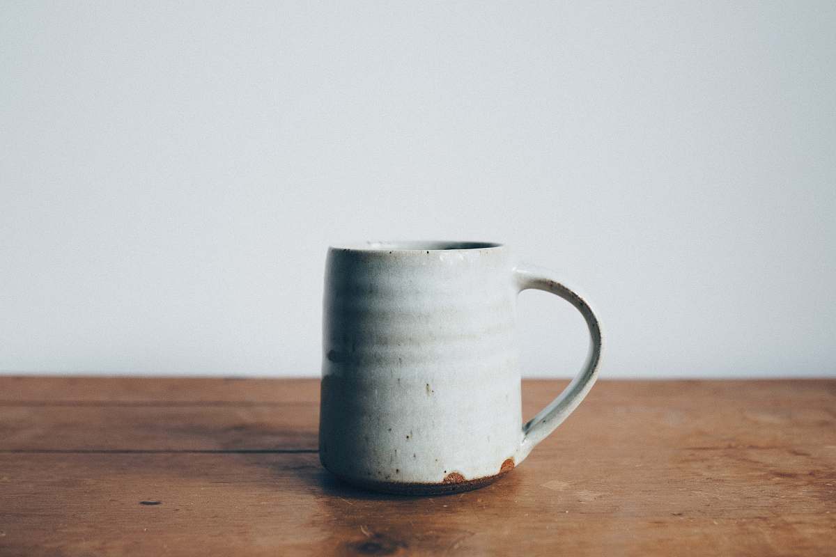 mug white ceramic mug on wooden table top ceramic