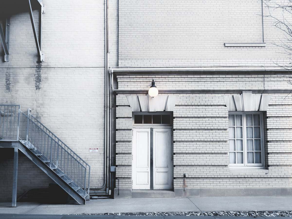 grey closed white door window