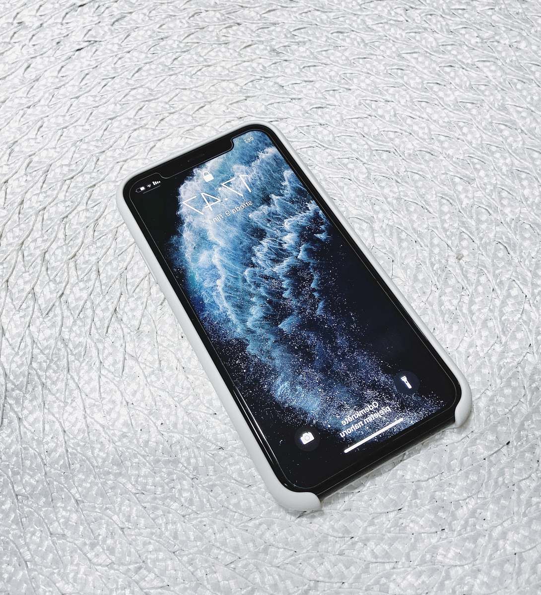 phone black Android smartphone on white surface cell phone