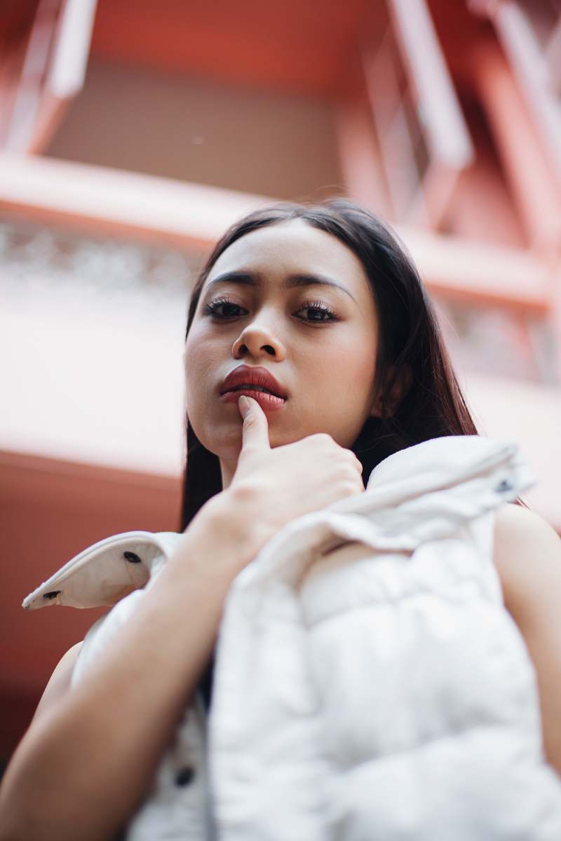 woman photo of woman wearing white jacket person