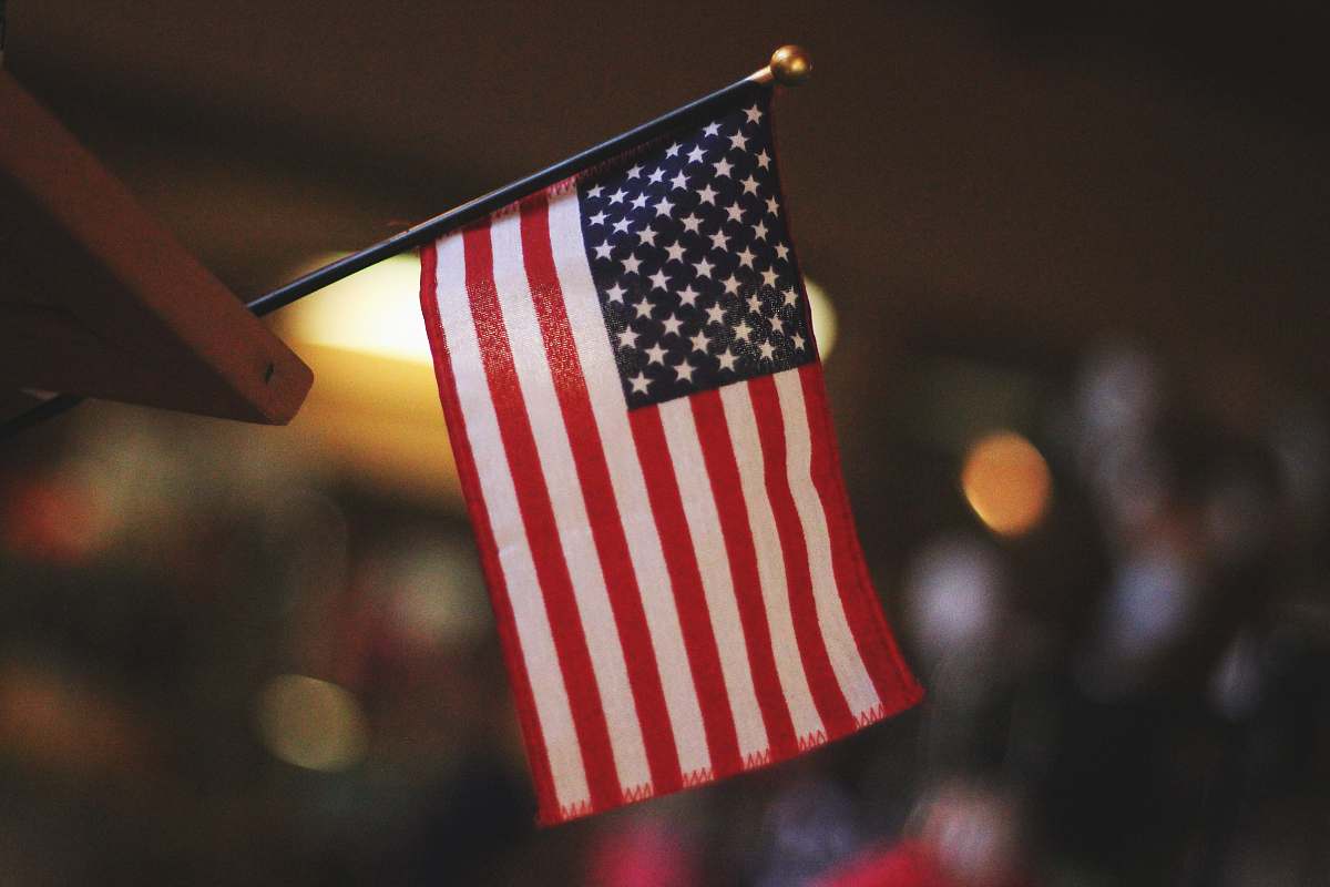 emblem selective focus photography of USA flaglet america