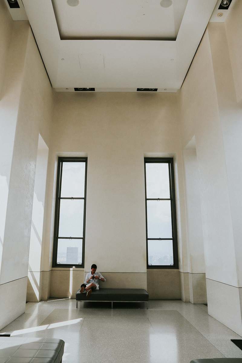 human person sitting on sofa person