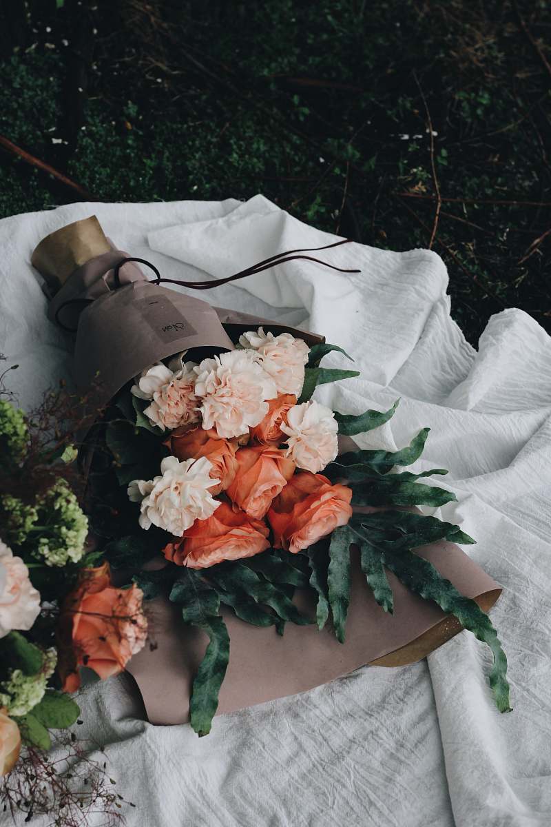 plant orange and pink petaled flower bouquet on table floral