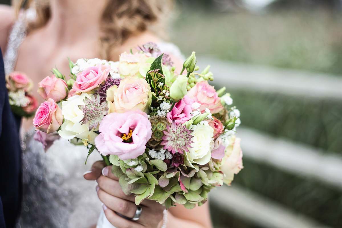 wedding woman holding bouquet of flowers flower arrangement