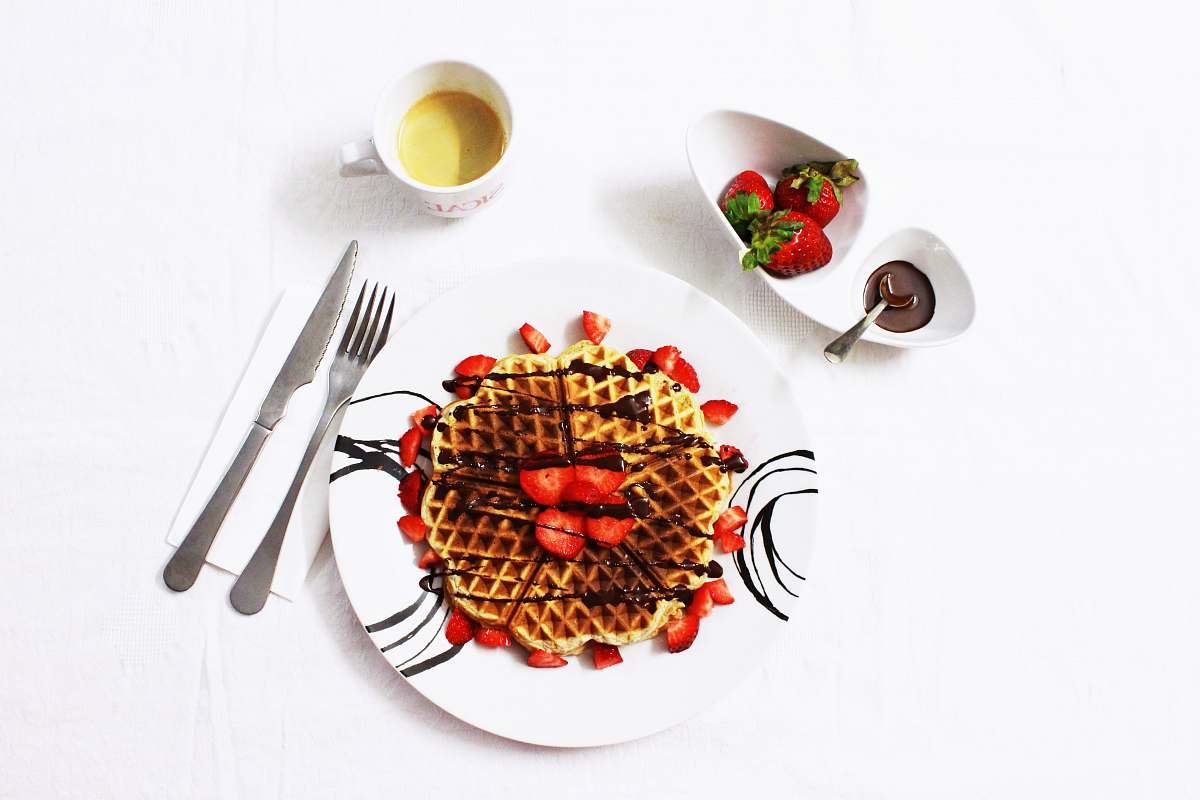 waffle flat lay photo of waffle with strawberries on plate strawberry