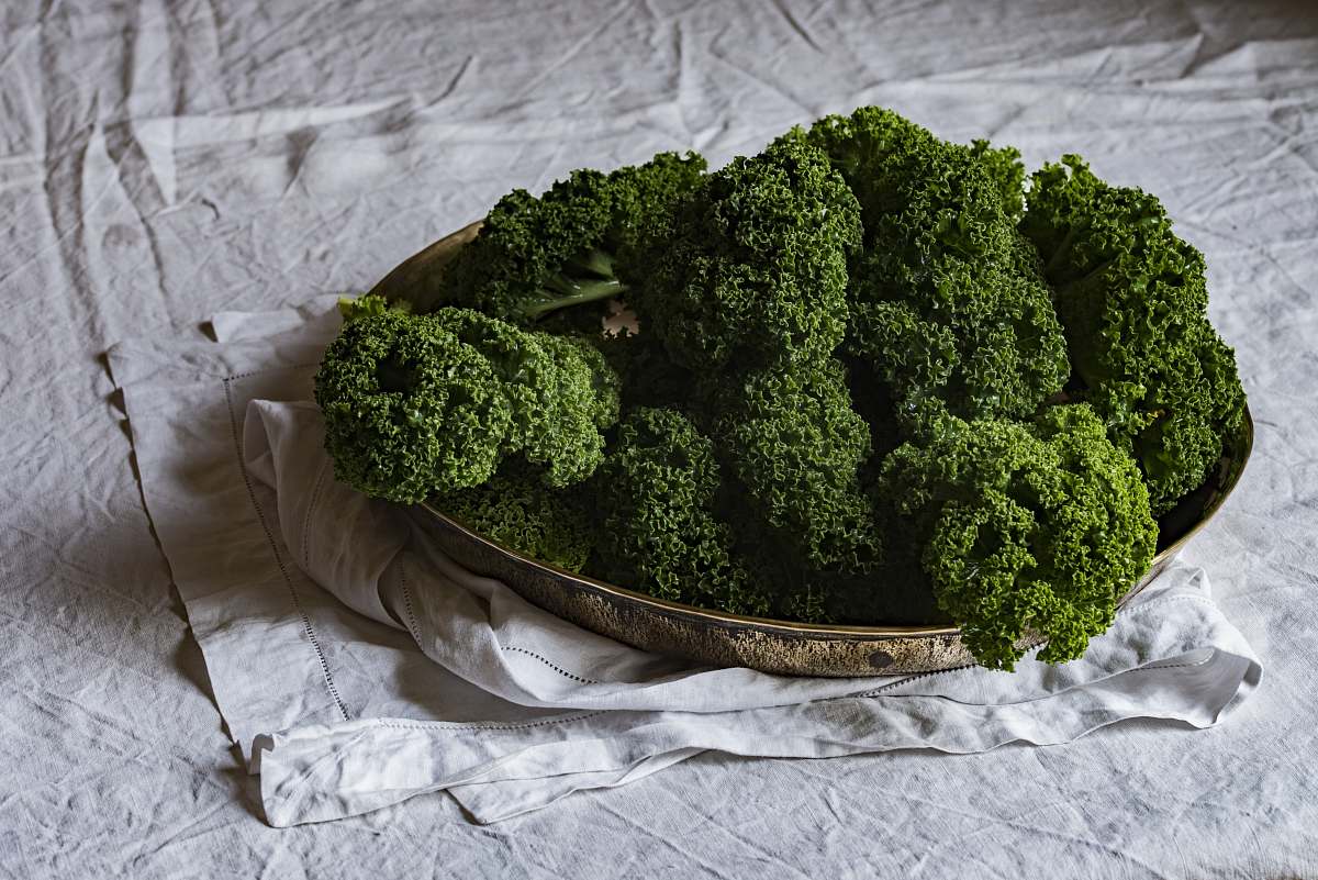 broccoli green leaf plants in gold-colored tray vegetable