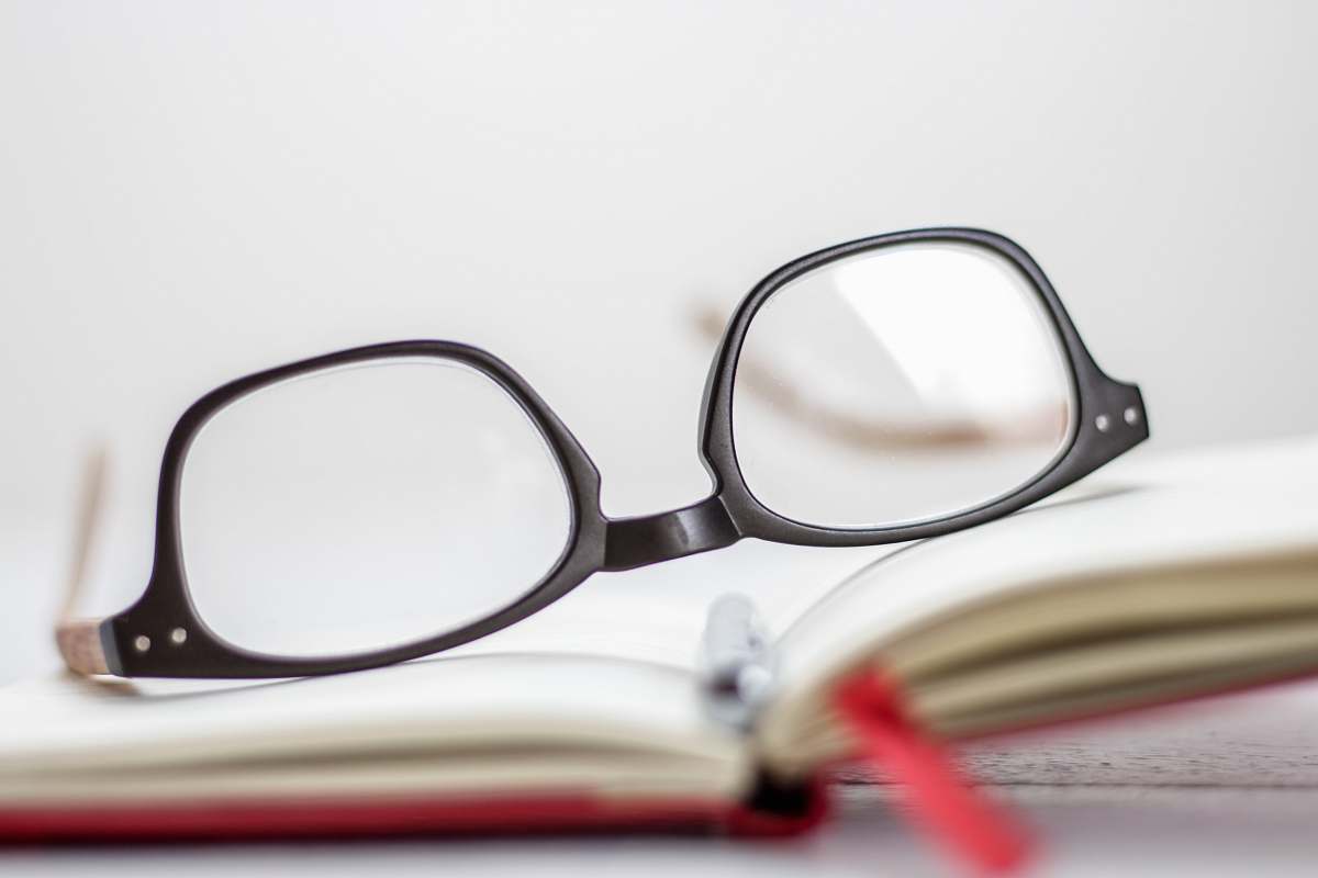 white clear eyeglasses with black frames frame