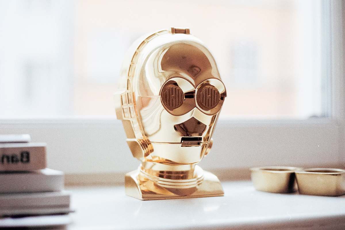 toy C-3PO decor on white surface c3po