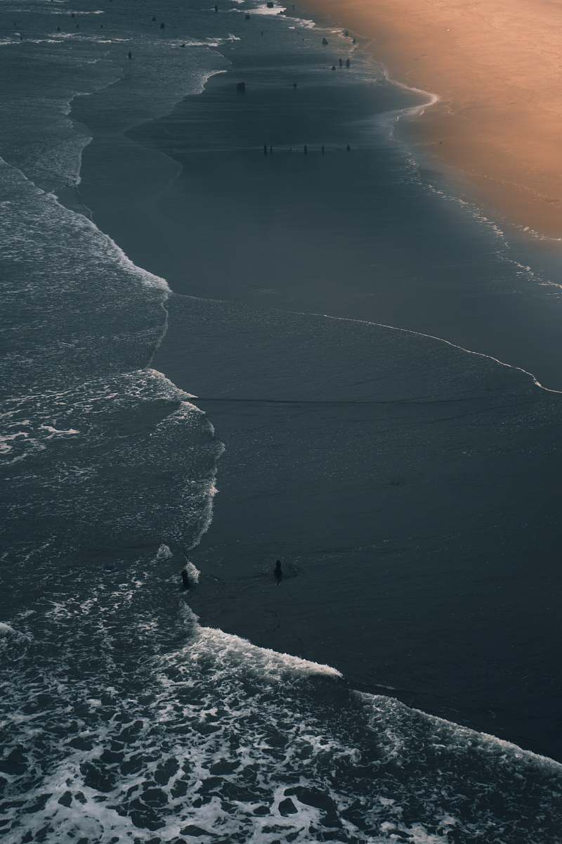 ocean bird's-eye view photography of people on beach water