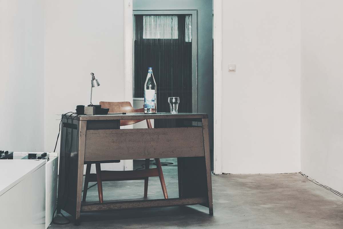 room clear glass bottle on brown wooden table interior