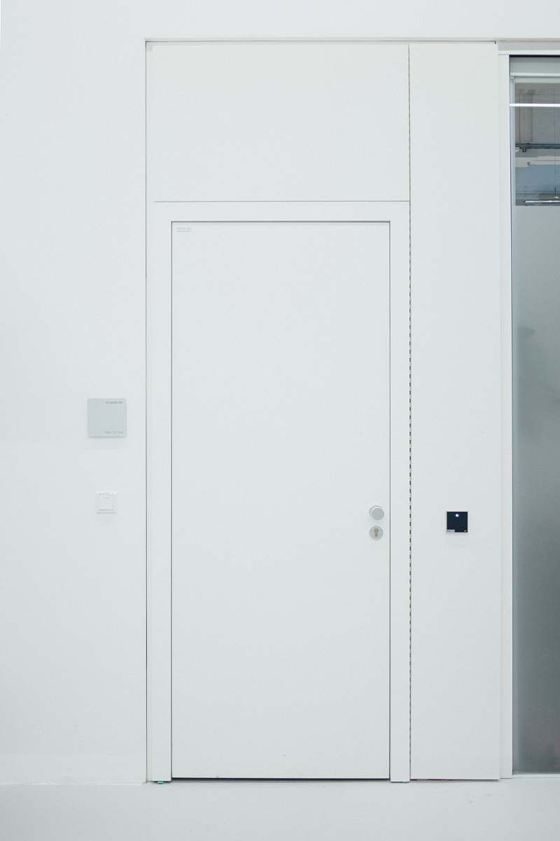 building closed white door door