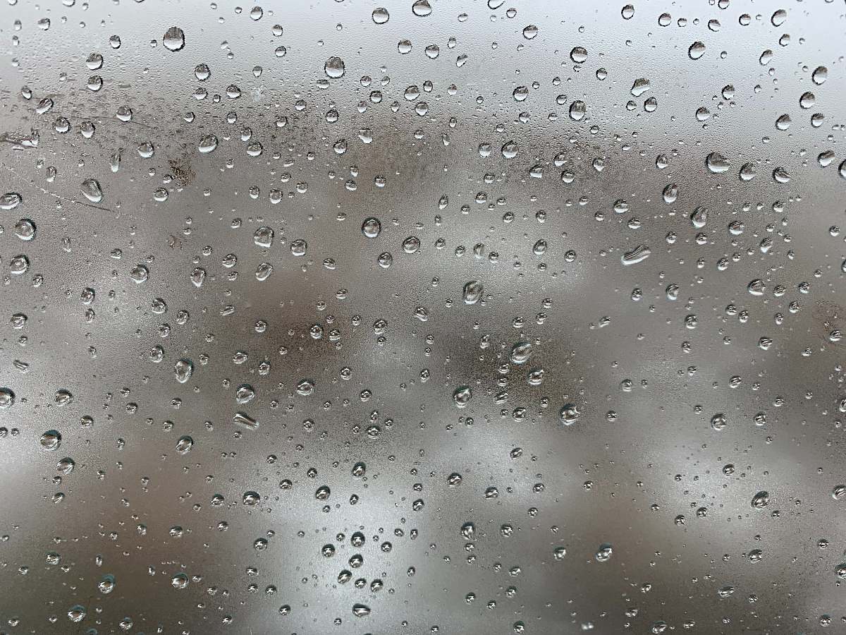 texture focus photography of water droplets on glass surface rug