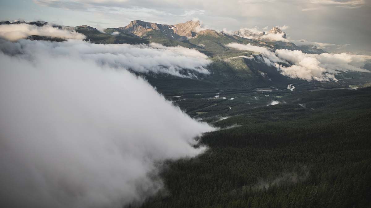 mountain forest under cloudy sky nature