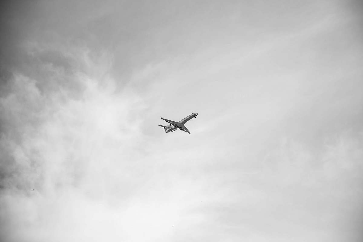 black-and-white Grayscale photo of airplane manchester