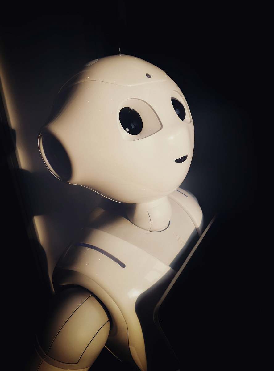 robot human robot toy near wall machine learning