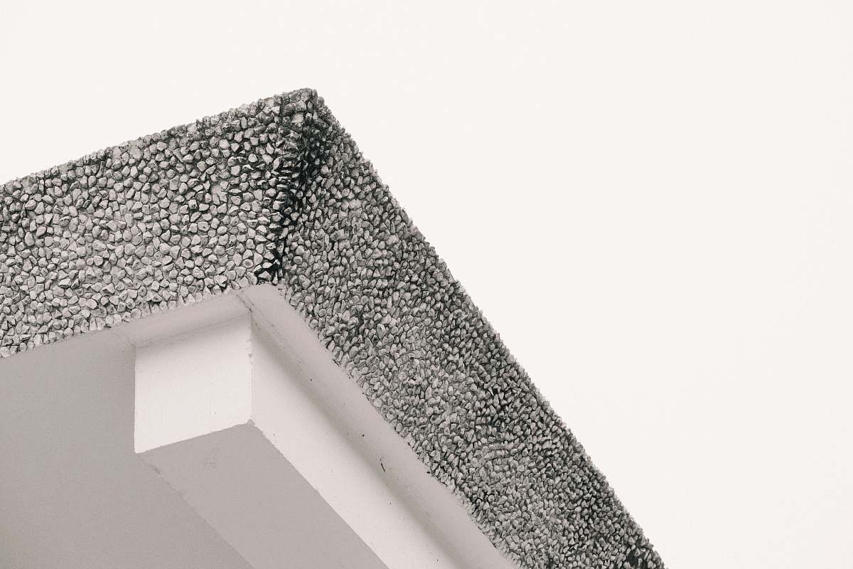 building low angle photo of ceiling triangle