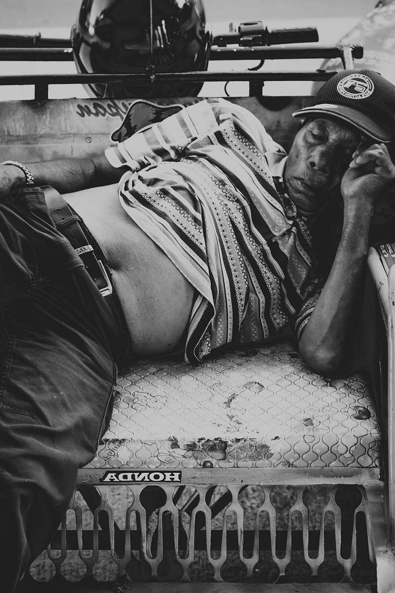 black-and-white man sleeping grayscale photo apparel
