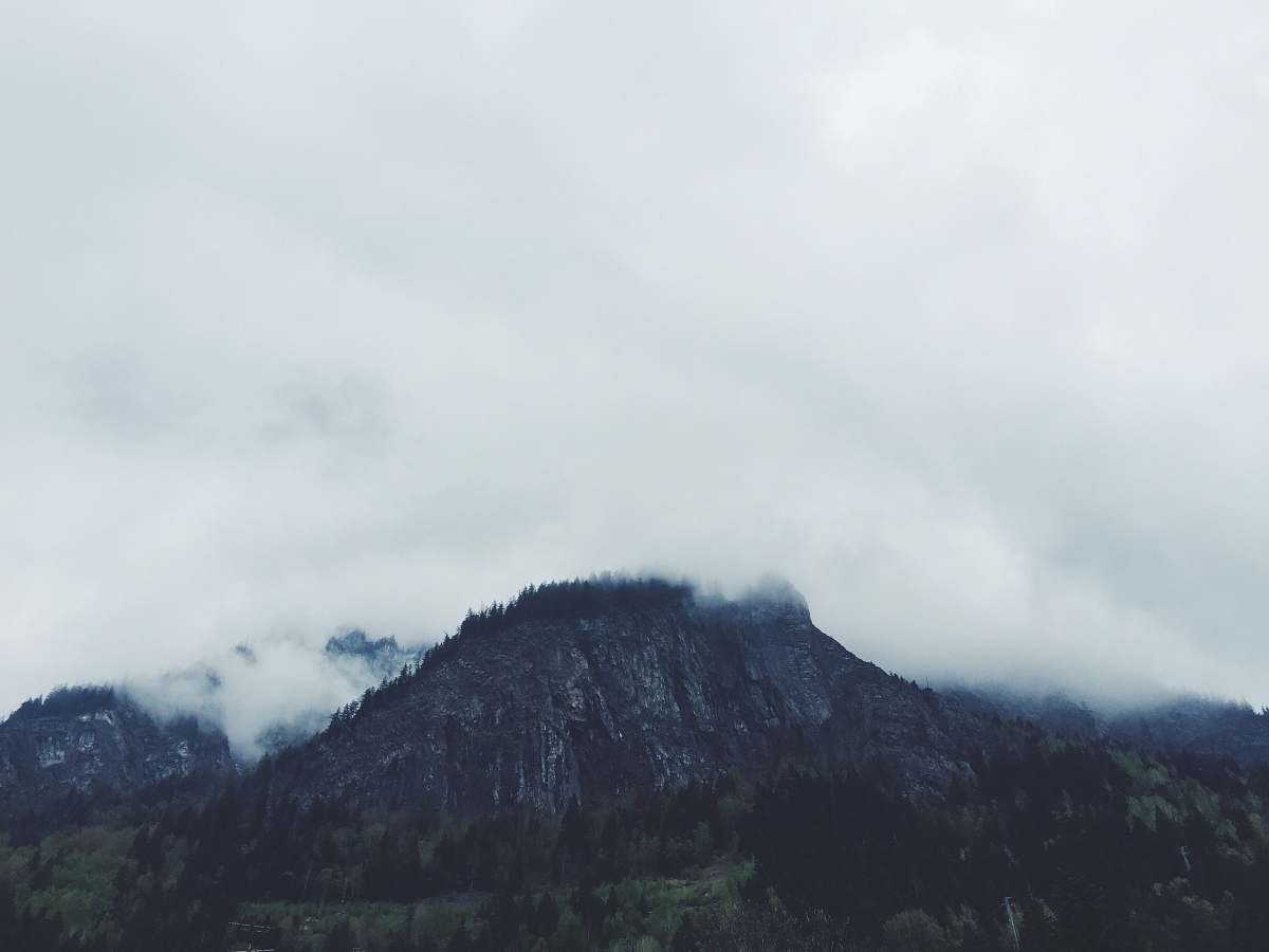 mountain photo of clouds covering mountain nature