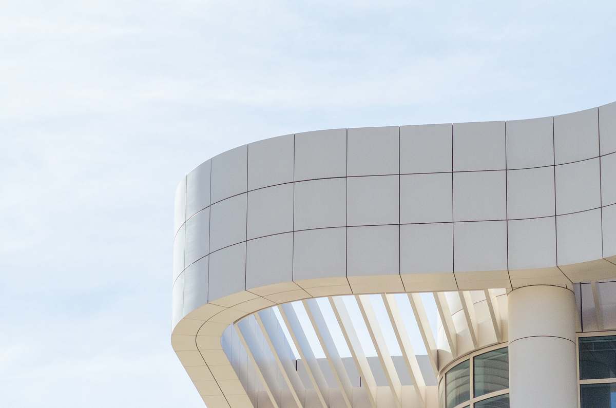 building photo of white building during day time architecture