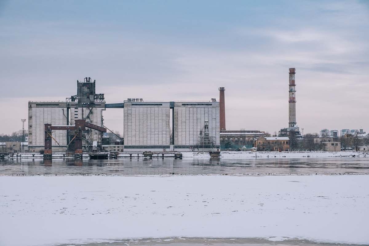 factory photo of white concrete buildings riga