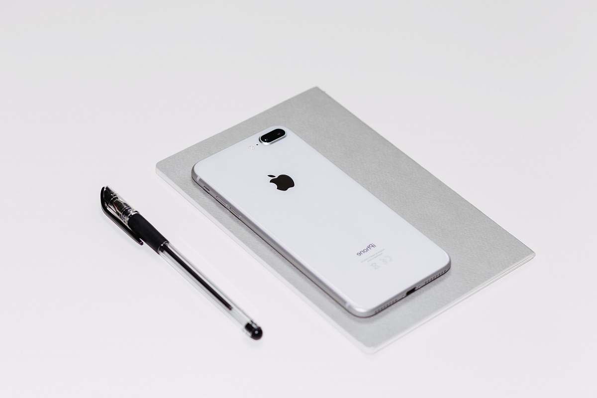 warsaw silver iPhone X beside black ballpoint pen poland